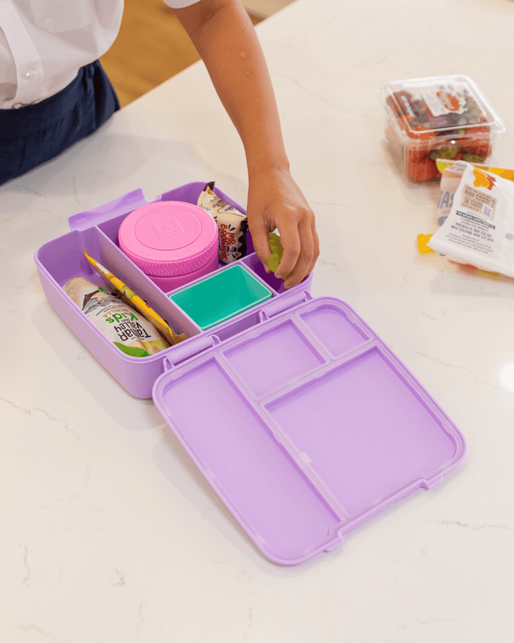 MontiiCo Feast Lunch Box - Lilac open lunch box with compartments and snacks