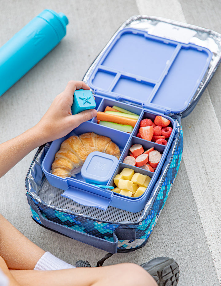 MontiiCo Feast Tray - Navy filled with snacks inside the feast lunch box