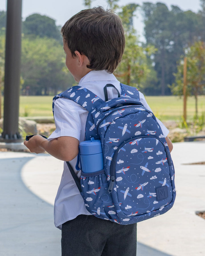 MontiiCo Mini Backpack - Jetset worn by child with fusion drink in the side pocket