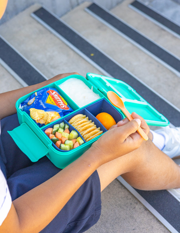 MontiiCo Bite Tray - Navy filled with different snacks inside bite lunch box