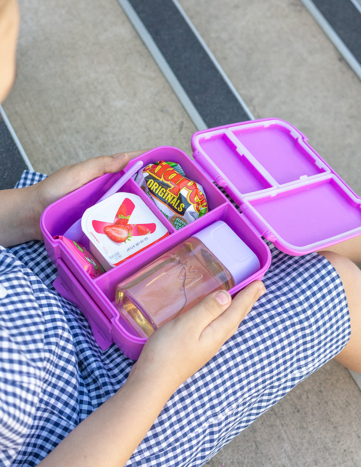 MontiiCo Bento Bottle - lilac filled with juice inside lunch box