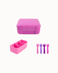 Pink lunch box set with compartments and forks on a white background