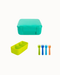 Green lunch box with yellow compartment and colorful forks on a white background