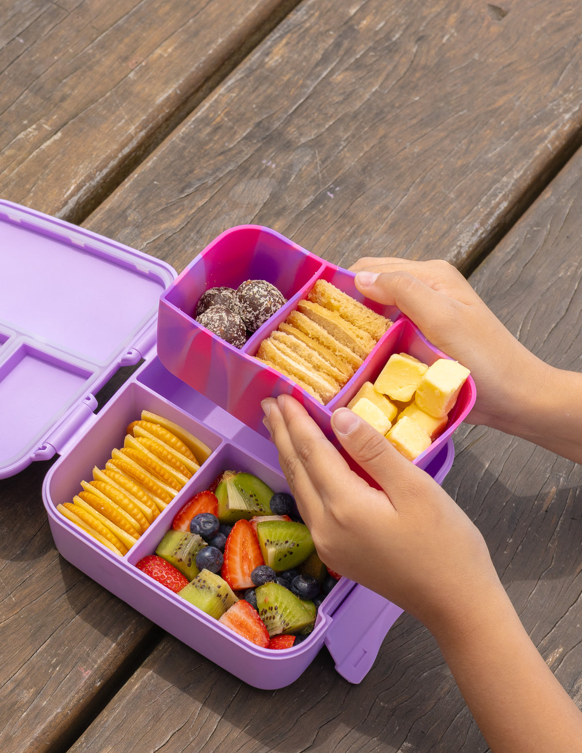 MontiiCo Bite Tray - Dusk Marble filled with different snacks inside bite lunch box