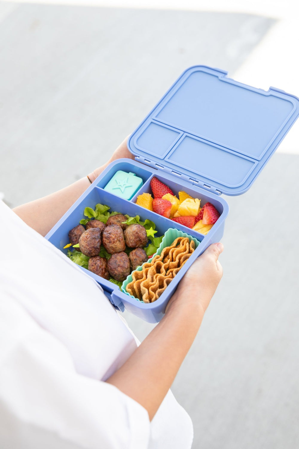 MontiiCo Bento Three Lunch Box - Splash -  open lunch box with compartments and snacks