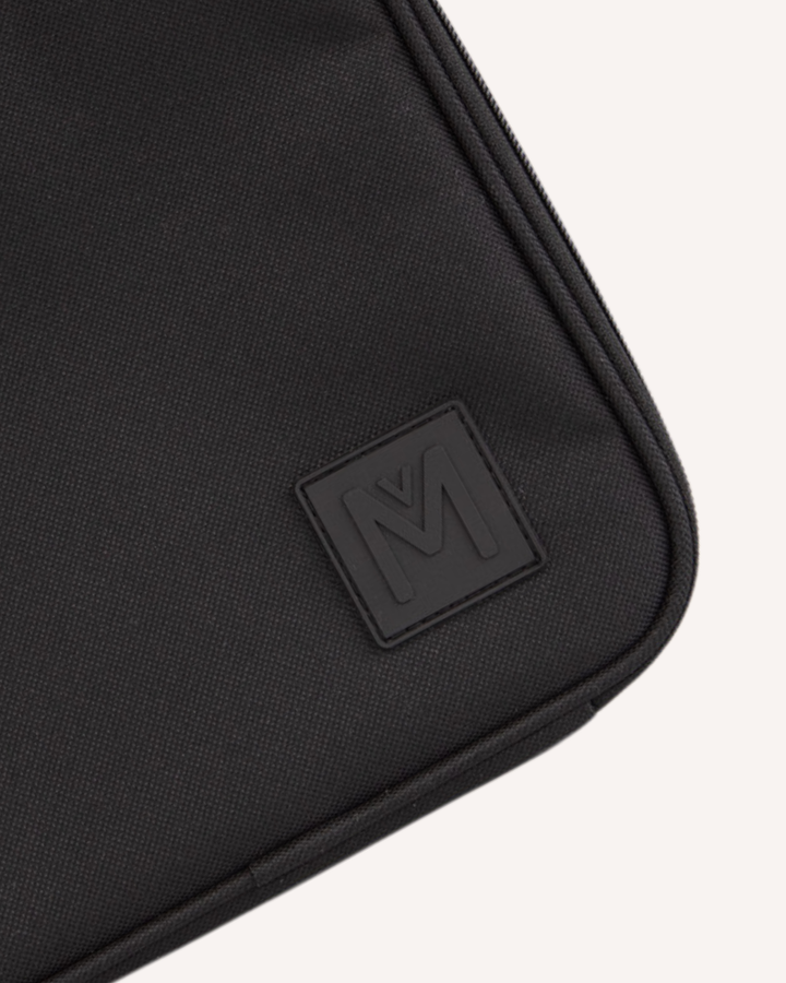 Black insulated lunch bag on a white background with a MontiiCo brand logo on a white background